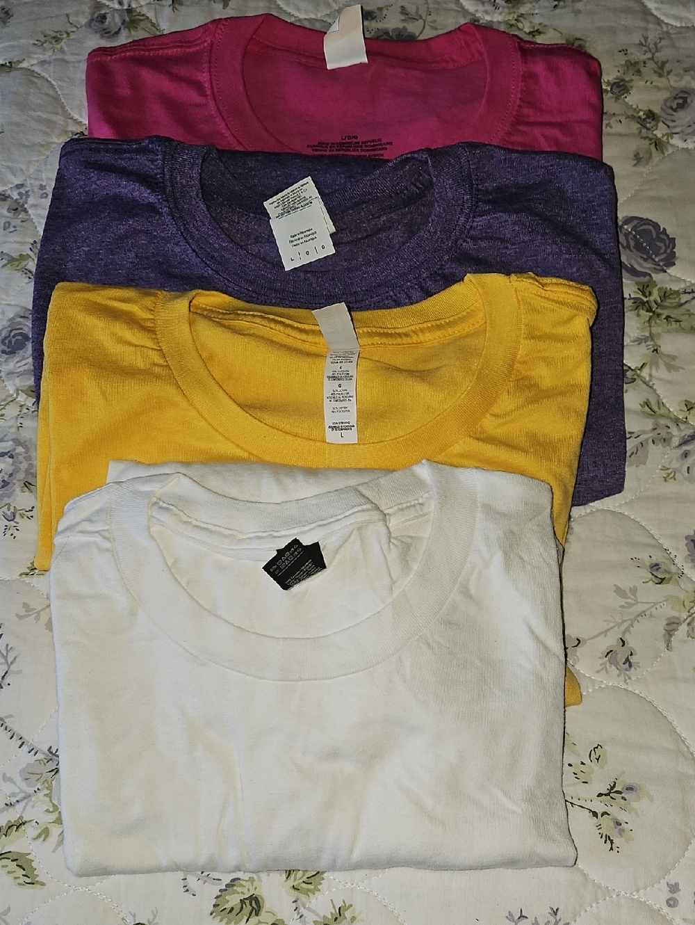 Stack of Four Crewneck Tees in White, Yellow, Purple, and Pink
